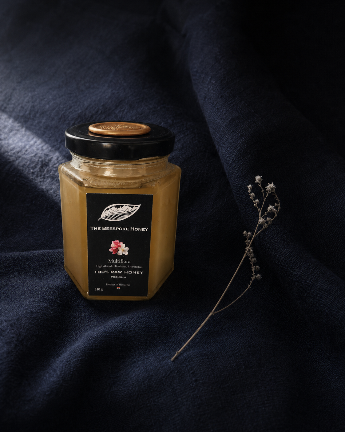 Highland Multiflora Honey A3300 — raw high-altitude Himalayan honey in a hexagonal black jar, The Beespoke Honey